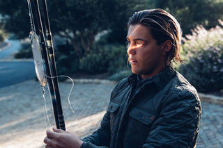 Professional surfer Connor Coffin getting his fishing poles ready.