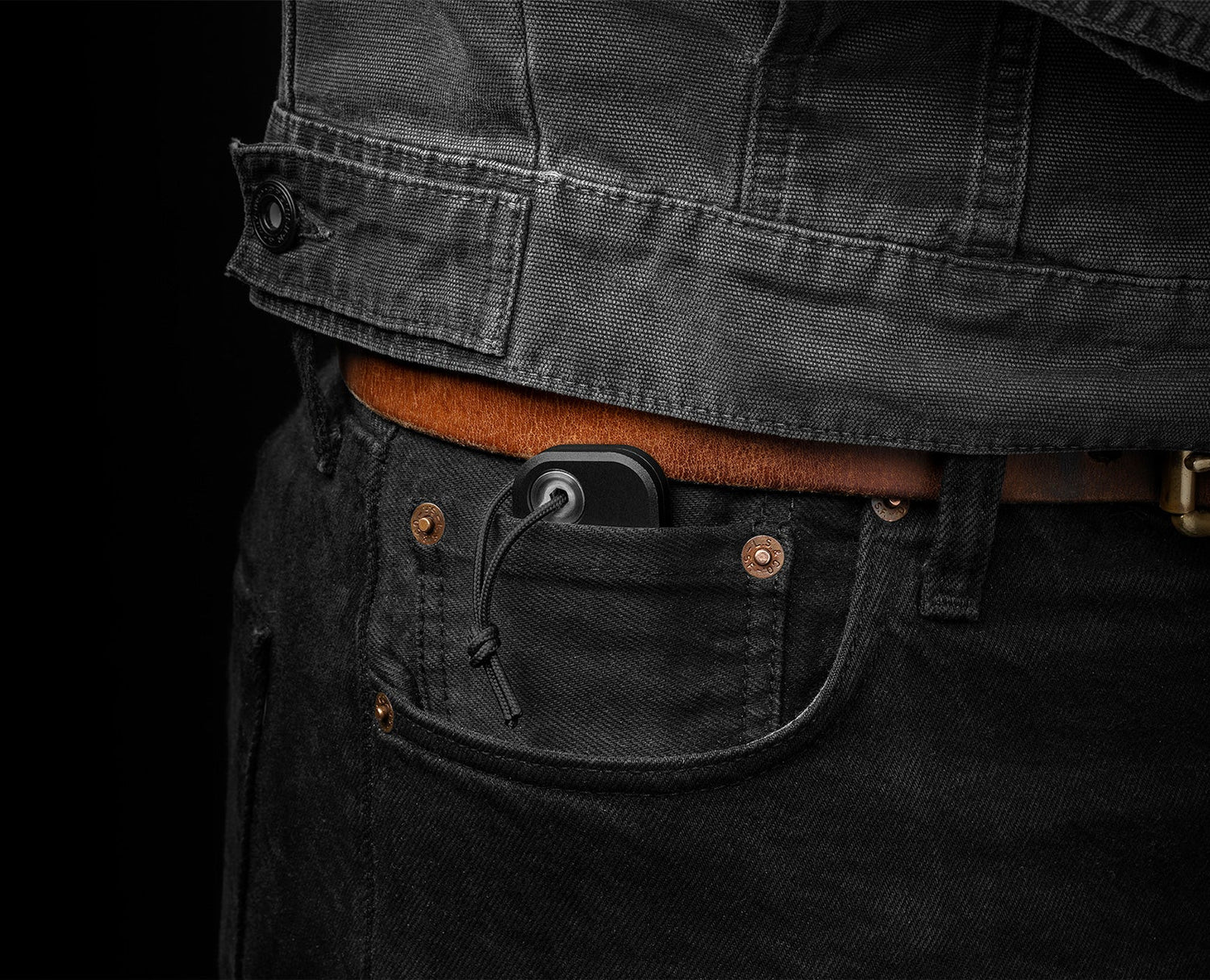 A black Palmer utility knife in pocket.