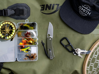 The Folsom EDC liner lock folding pocket knife with a tackle box.