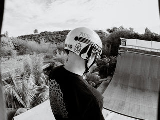 Professional skateboarder Zak Miller about to drop into a half pipe in San Diego, California. 