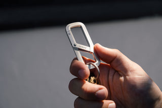 The Madison carabiner closed in hand.