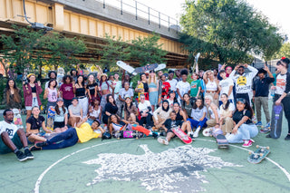 A large group of youth skateboarders in New York.