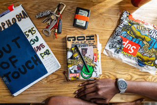 Professional skateboarder Beatrice Domond with the Nocturne collection on the table in front of her.