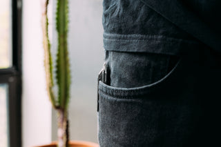 The Ellis ultra slim pocket knife in a man's pocket.