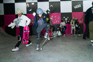 A young skater girl working on her ollie.