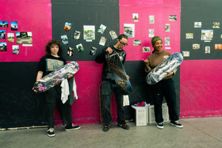 Skater kids getting new skate decks at a Harold Hunter Foundation event.