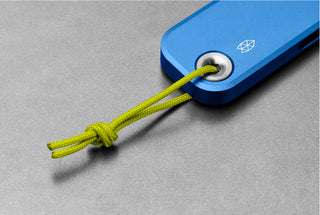 The lanyard of the cerulean Palmer utility box cutter knife. 