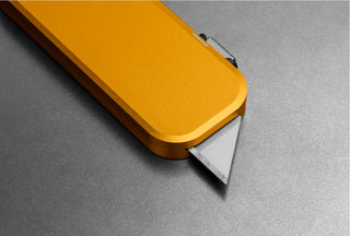 The blade of the Palmer utility box cutter knife in canary yellow. 