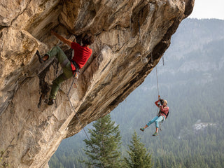 Professional rock climber and photographer Savannah Cummins getting into position for the shot.